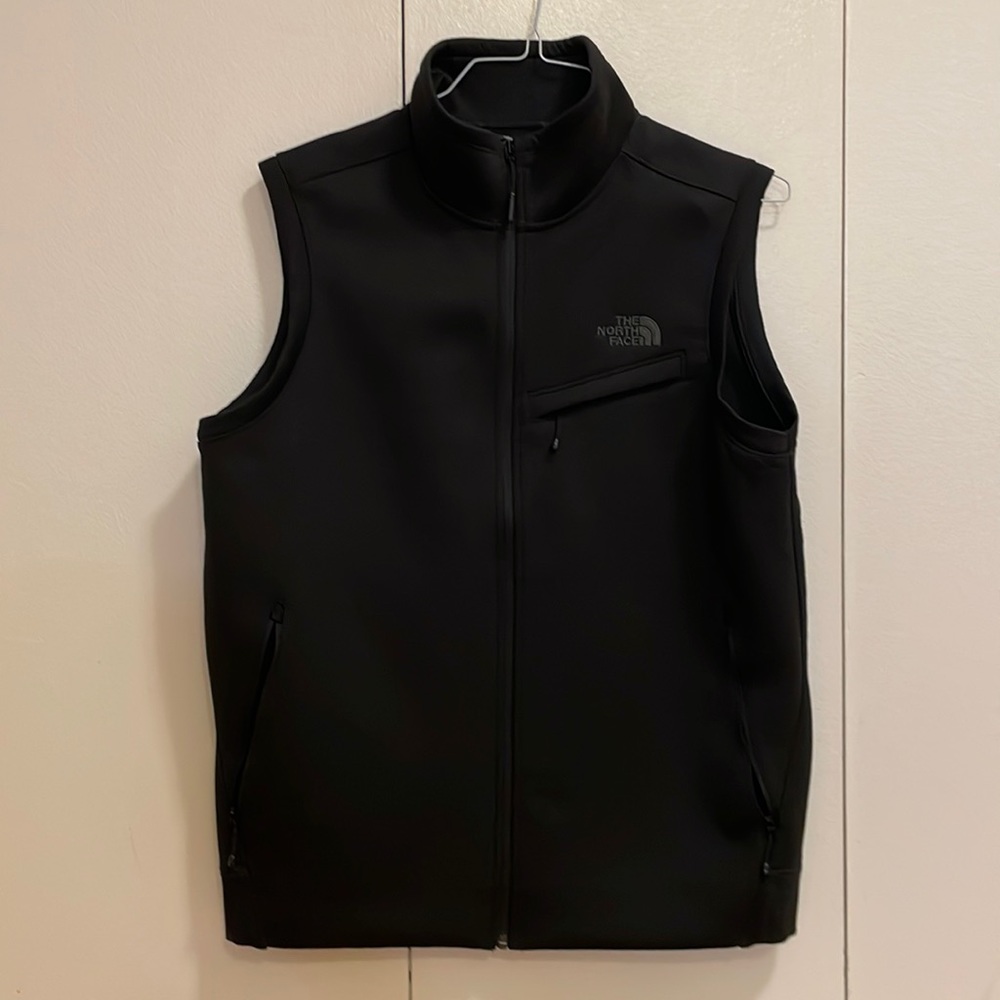 The North Face men sleeveless black zip up vest in size large; basically new